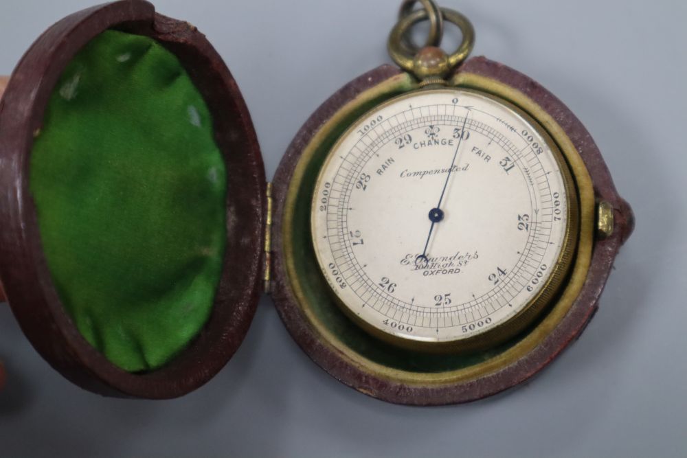 E. Saunders, 100, High Street, Oxford. A brass cased pocket barometer, cased